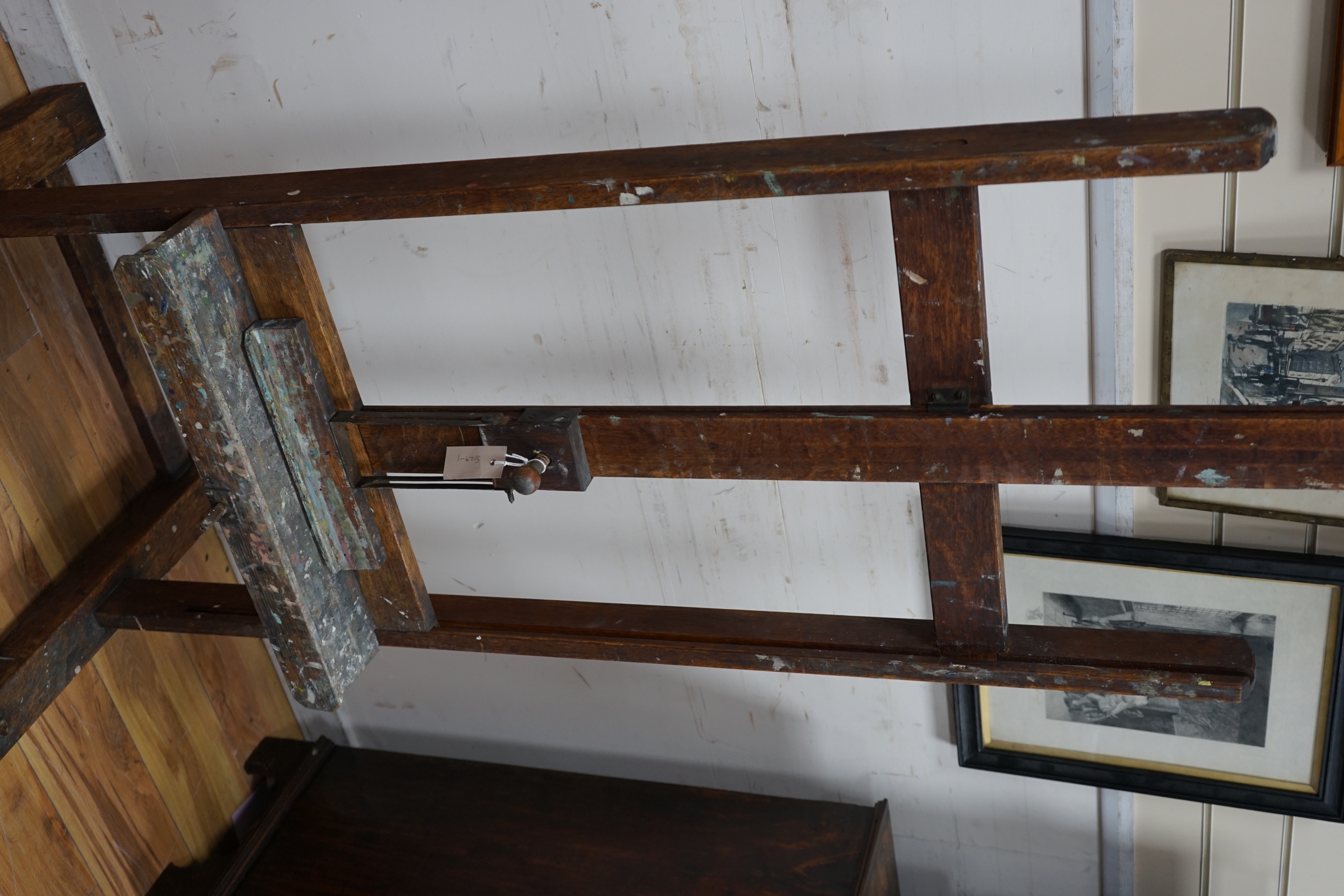 A Victorian oak adjustable artist's studio easel, by Reeves & Son, height 67cm